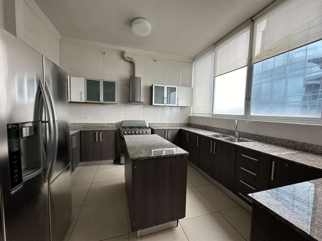 Bright kitchen with granite countertops, stainless steel appliances, island Costa del Este Panama
