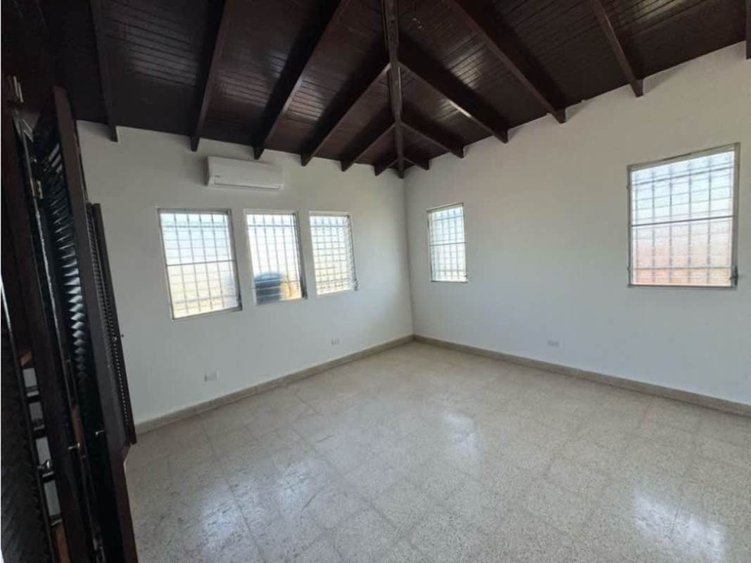 Updated bathroom with gray mosaic tiled shower glass enclosure and vanity El Dorado corner house
