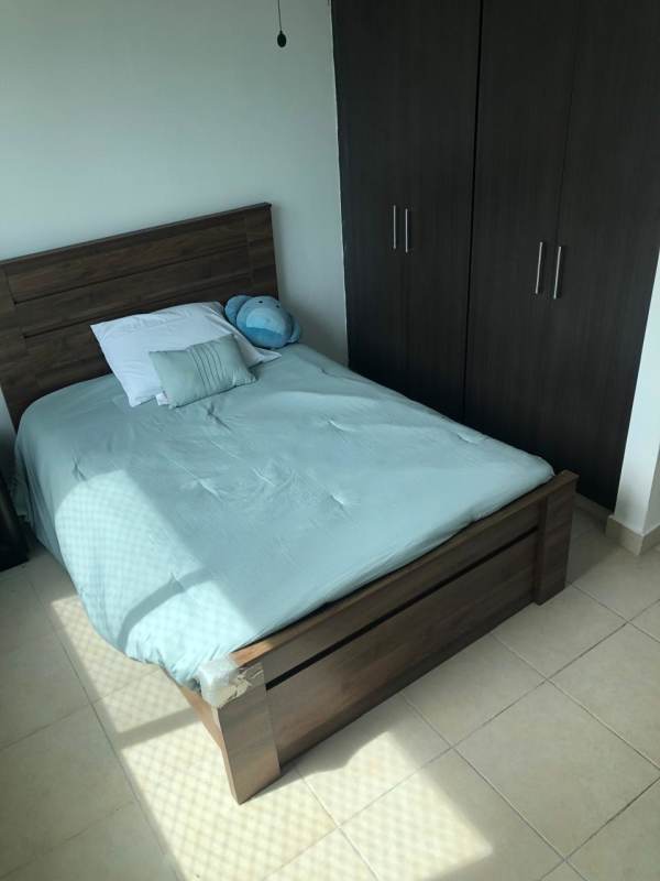 Bedroom with large window, AC, built-in closet in furnished apartment for rent in Clayton Park Panama City