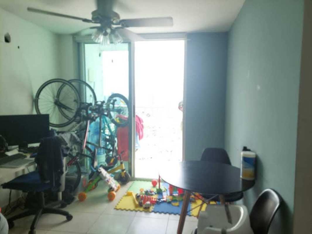 Swimming pool and recreation area on rooftop with skyline views at PH Riverside Panama