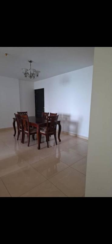 Bright living dining room furnished overlooking Panama City in San Francisco Bay