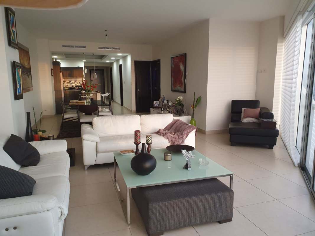 Modern luxury living room with floor to ceiling windows ocean view PH Rivage Avenida Balboa Panama