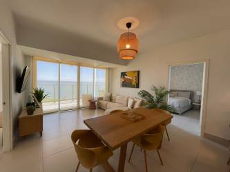 Bright secondary bedroom with window overlooking gardens in PH Solaria Punta Caelo Panama