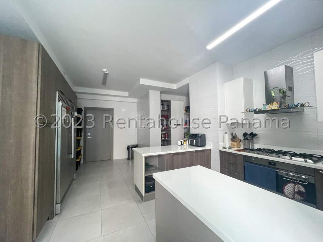 Master bedroom with floor-to-ceiling windows ocean view and modern decor PH Regalia Costa del Este Panama