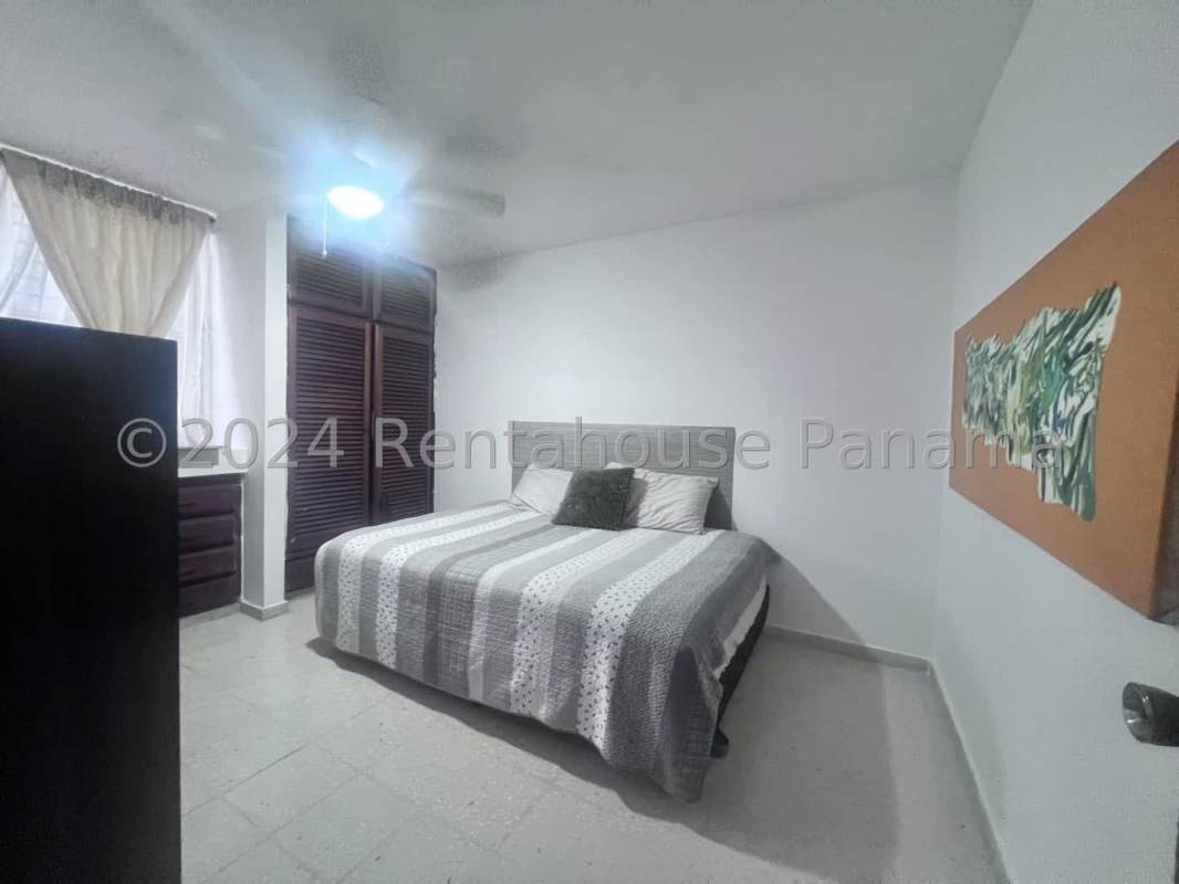 Bathroom with ceramic tiles walk-in shower and sink in PH Aida Panama City