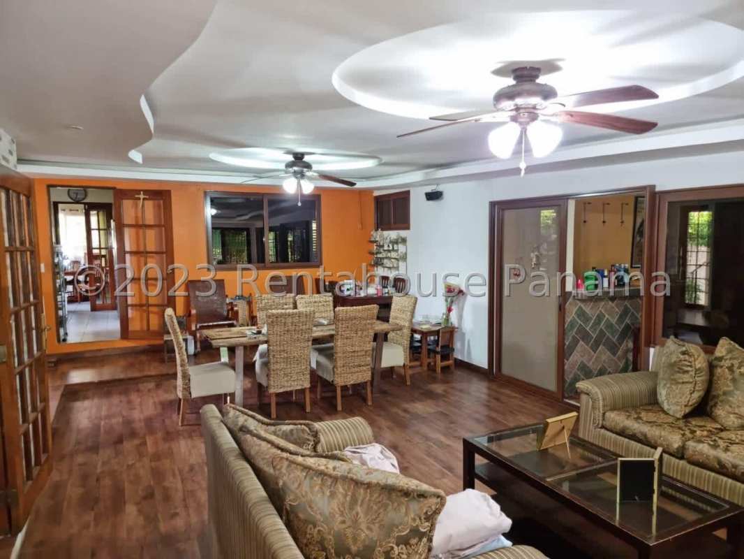 Kitchen with wooden cabinets and natural light Panama City home