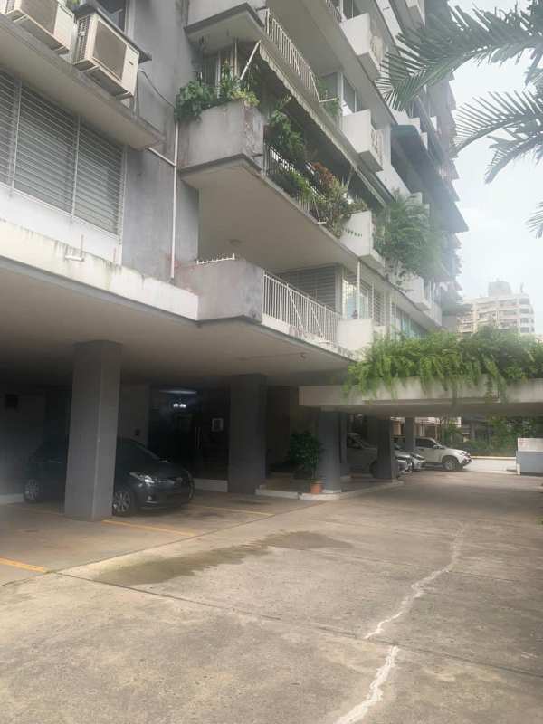 Marble wall lobby entrance with glass doors at PH Marina Plaza