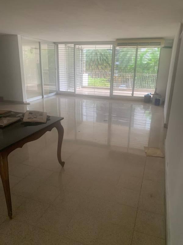 Elevator lobby with stone walls and stainless steel doors PH Marina Plaza