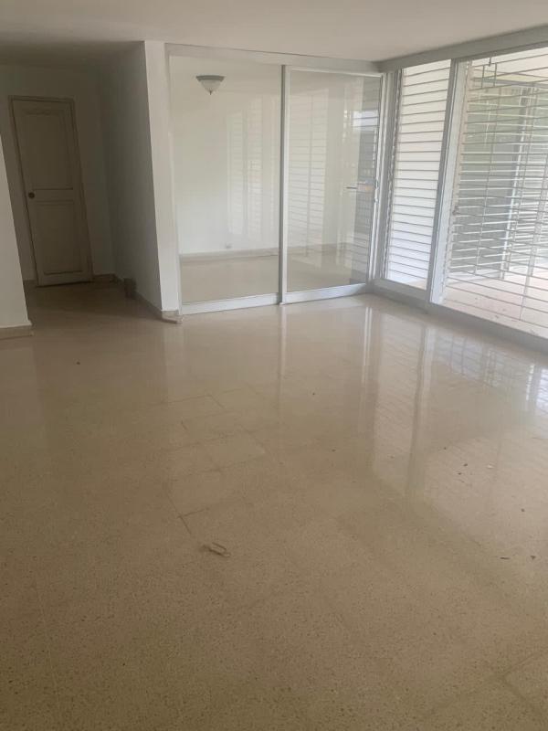 Spacious living room with glass enclosure balcony PH Marina Plaza Obarrio