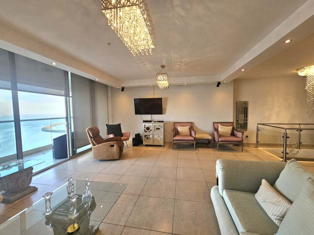 Fully equipped gourmet kitchen with granite island and ocean views at PH Rivage Panama City