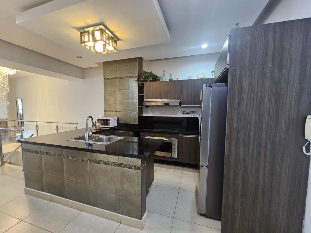 Modern loft with spiral stairs connection two floors in PH Rivage Avenida Balboa