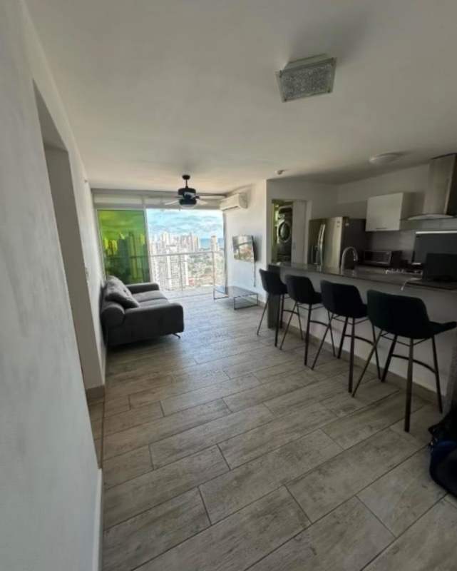 Open plan living and kitchen with city views, granite counters at PH Metropolitan Park Carrasquilla Panama