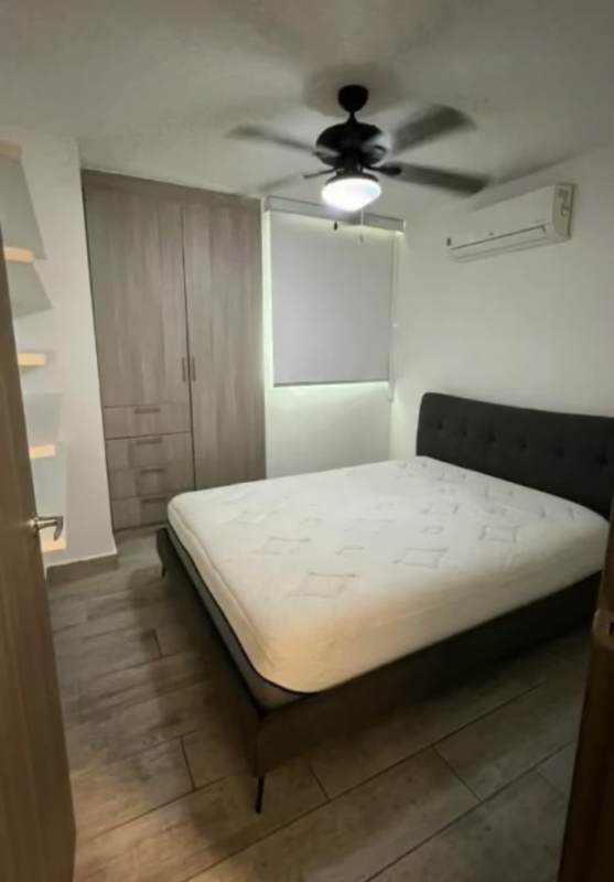 Kitchen with granite countertops, double sink, stainless appliances at PH Metropolitan Park Panama