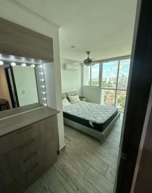 Bedroom with queen bed, AC and balcony access at PH Metropolitan Park Carrasquilla Panama City