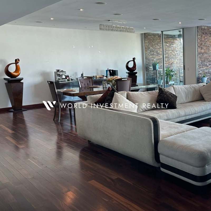 Spacious master bedroom with floor-to-ceiling glass balcony and panoramic Pacific Ocean view at PH Aquamare