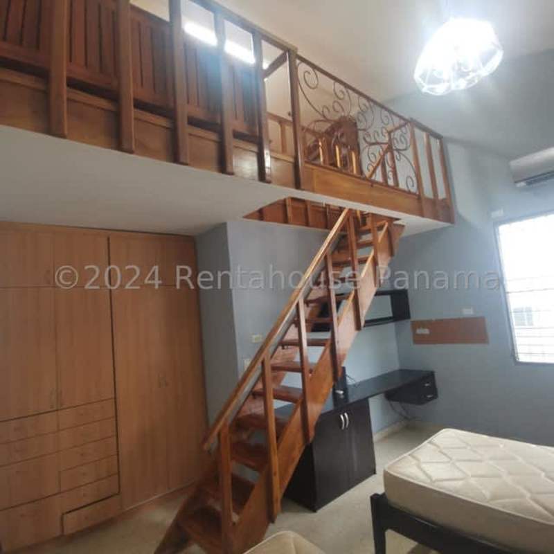 Bright spacious living room with AC and garden view in Obarrio Panama home