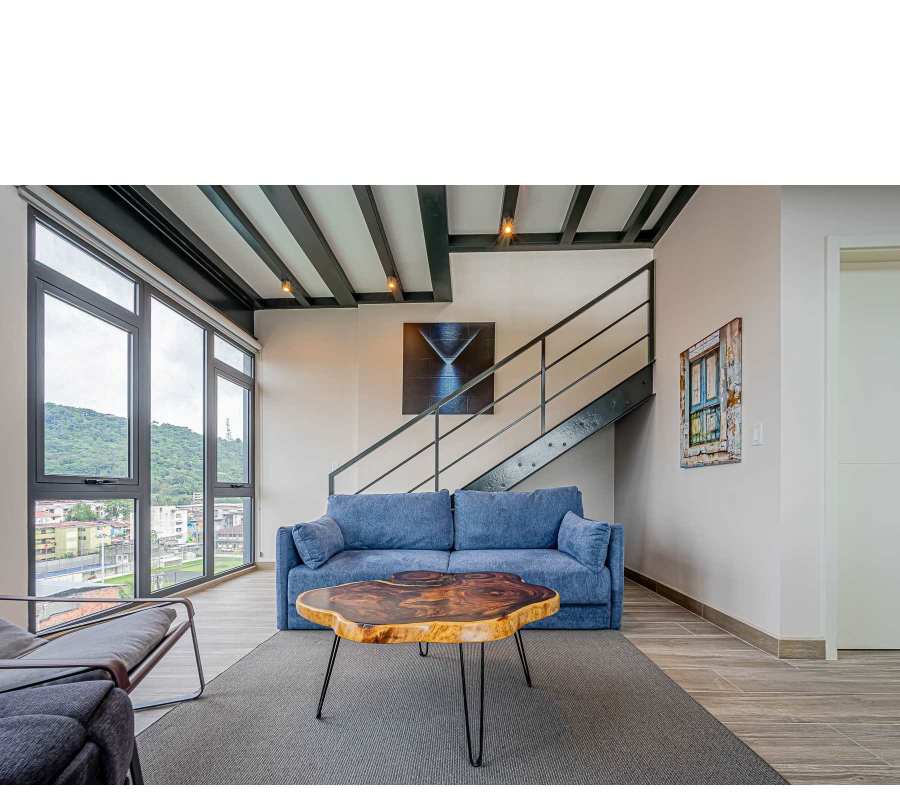 Modern bedroom with ensuite bath and city views in PH Casco View Loft Panama