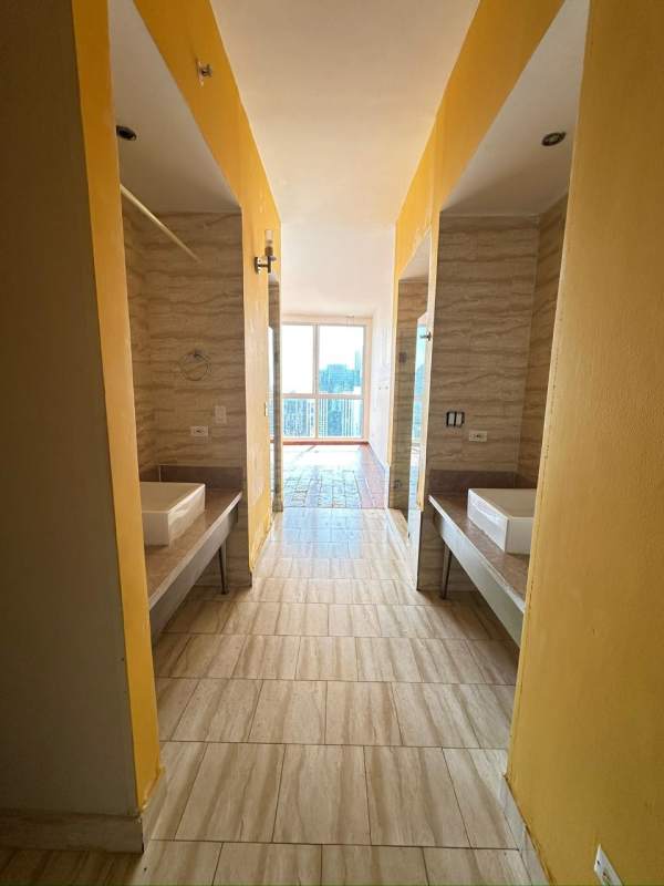 Contemporary kitchen with granite countertops, tile backsplash and modern cabinetry in PH Denovo Panama City