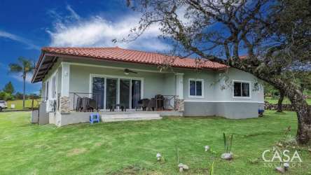 Covered outdoor terrace overlooking lush gardens with mountain views Boquete Canyon Village Panama