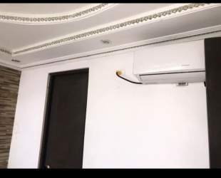 Bedroom with gold accent ceiling large window split AC PH Silver City Portobelo Panama