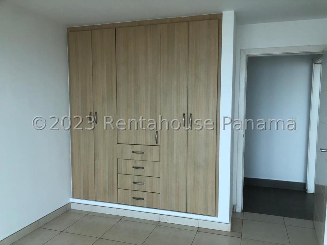 Modern bathroom with glass-enclosed shower, vanity and tiles in PH Riverside condo Panama