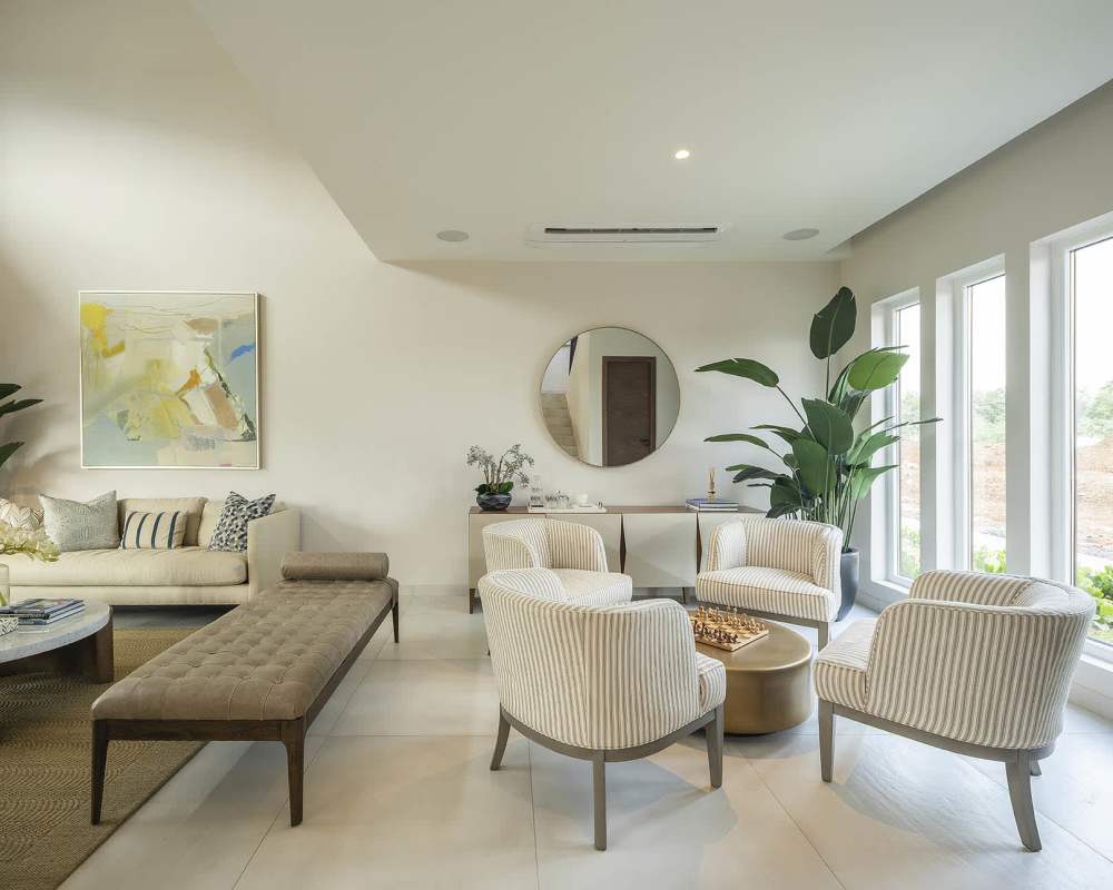 Contemporary bedroom with twin beds, large window, colorful accents in Santa María Panama