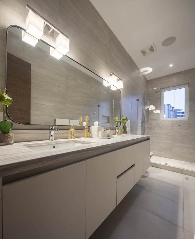 Stylish modern kitchen with stainless appliances and large window in Santa María Golf & Country Club Panama