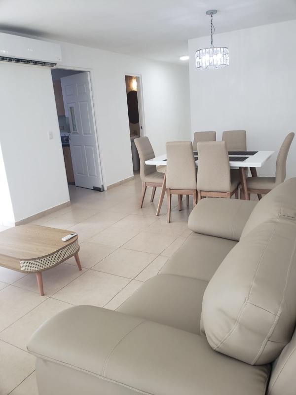 Minimalist dining area connected to living space in PH Sol del Este Costa del Este Panama