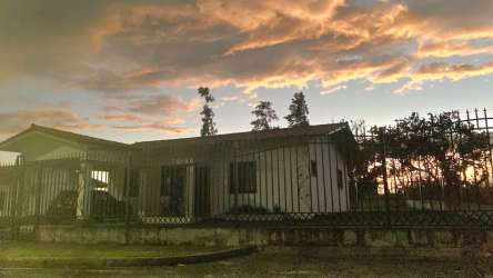 Spacious fenced yard with gazebo outdoor seating area Boquete mountain home Panama