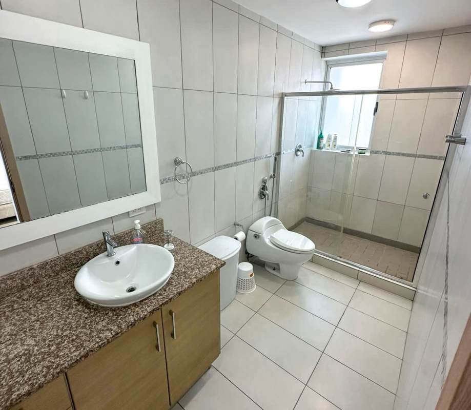 Kitchen with granite counters and stainless appliances in PH Moon Tower Coco del Mar Panama City