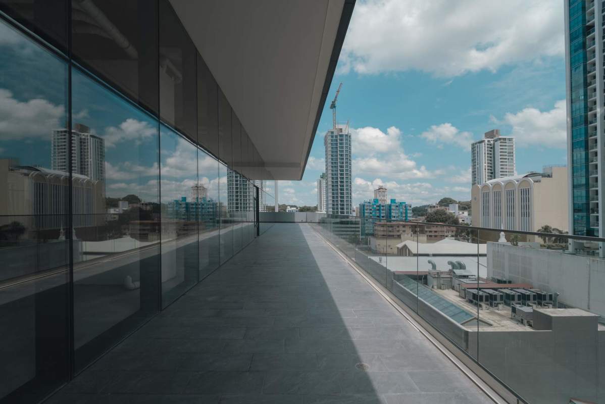 Unfinished commercial interior with concrete floors and exposed ceiling at Armani Plaza Panama