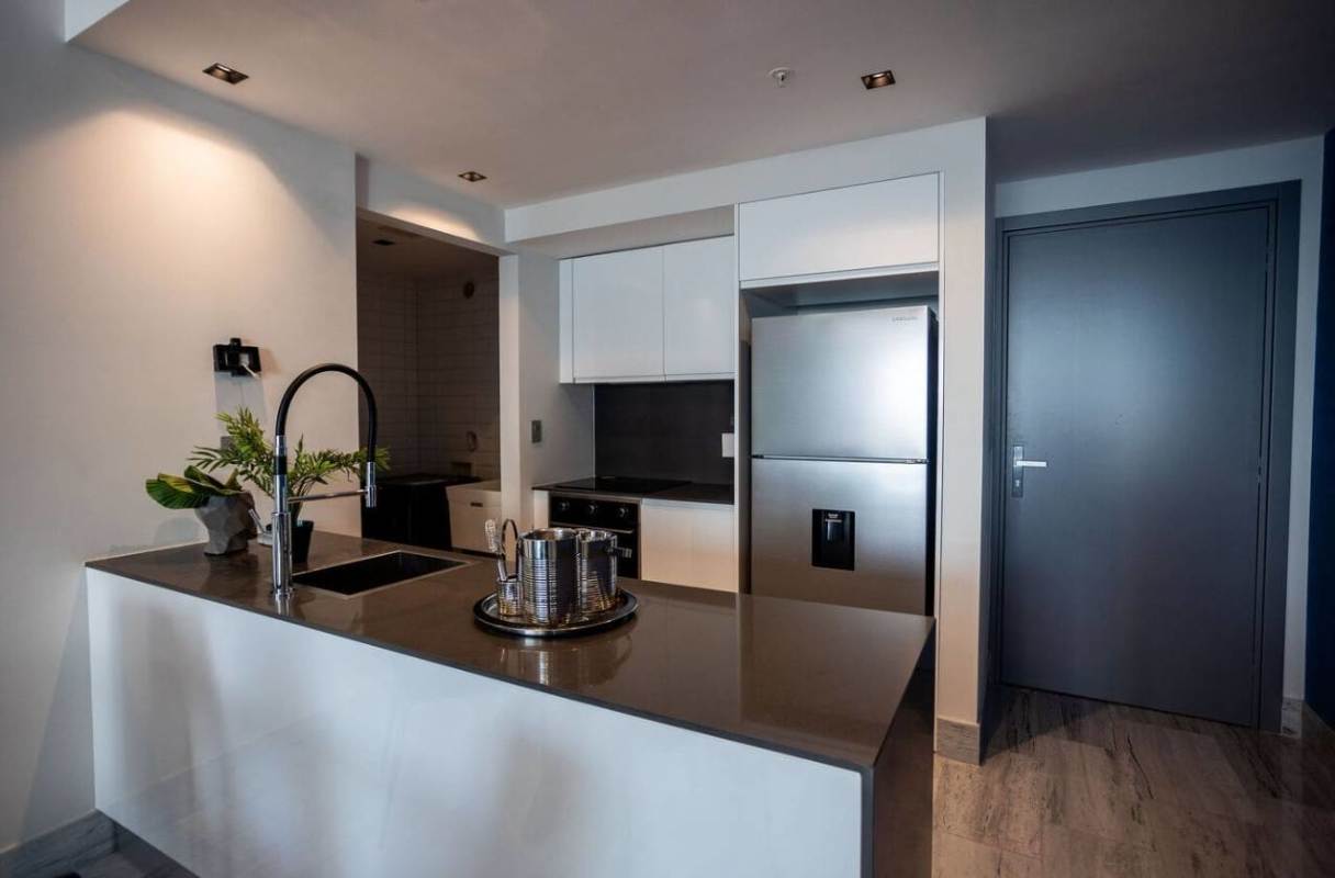 High-rise balcony with skyline and ocean views in Armani Residences Avenida Balboa Panama City