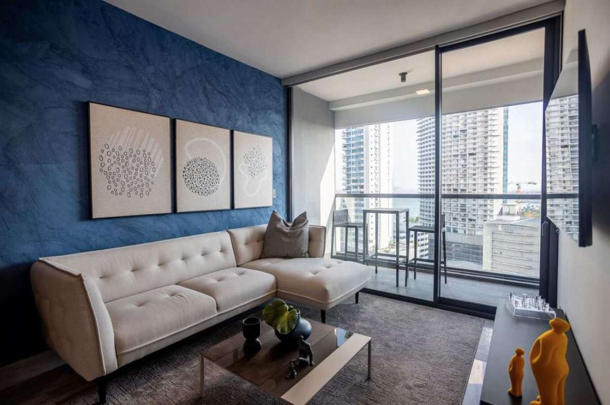 Contemporary kitchen with island, stainless appliances in Armani Residences Bella Vista Panama