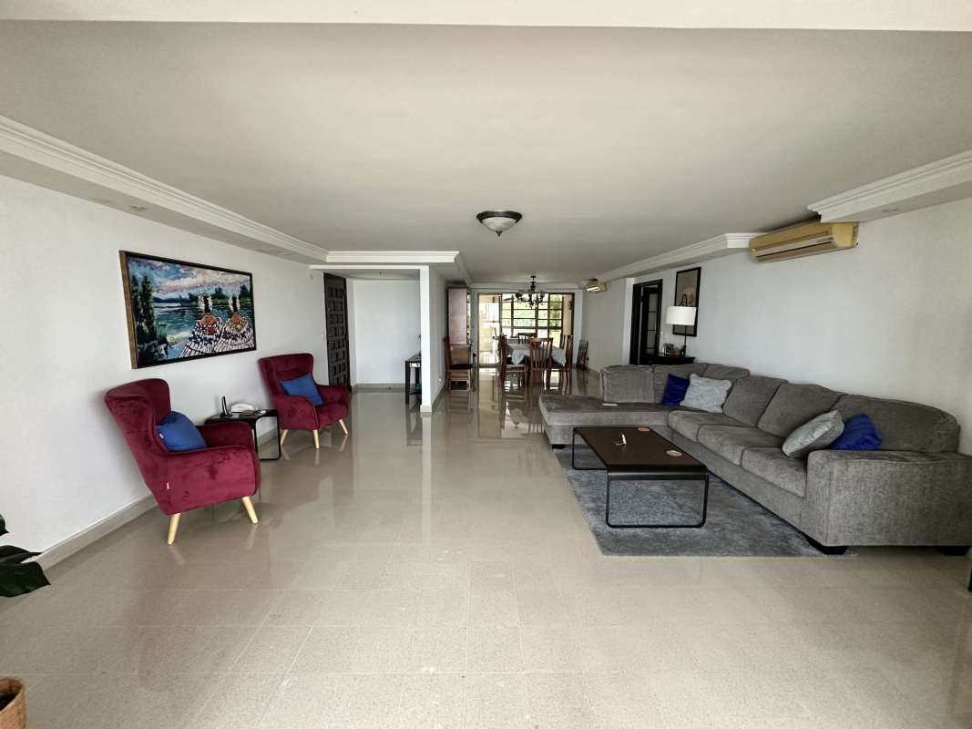 Modern bathroom with granite counters, double sinks, glass shower, and bathtub in Camino Real Paitilla