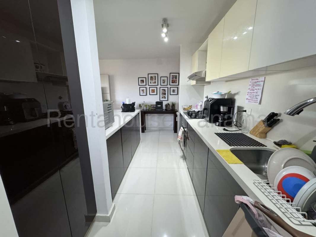 Contemporary kitchen with granite counter and built-in appliances Villa Lucre Panama