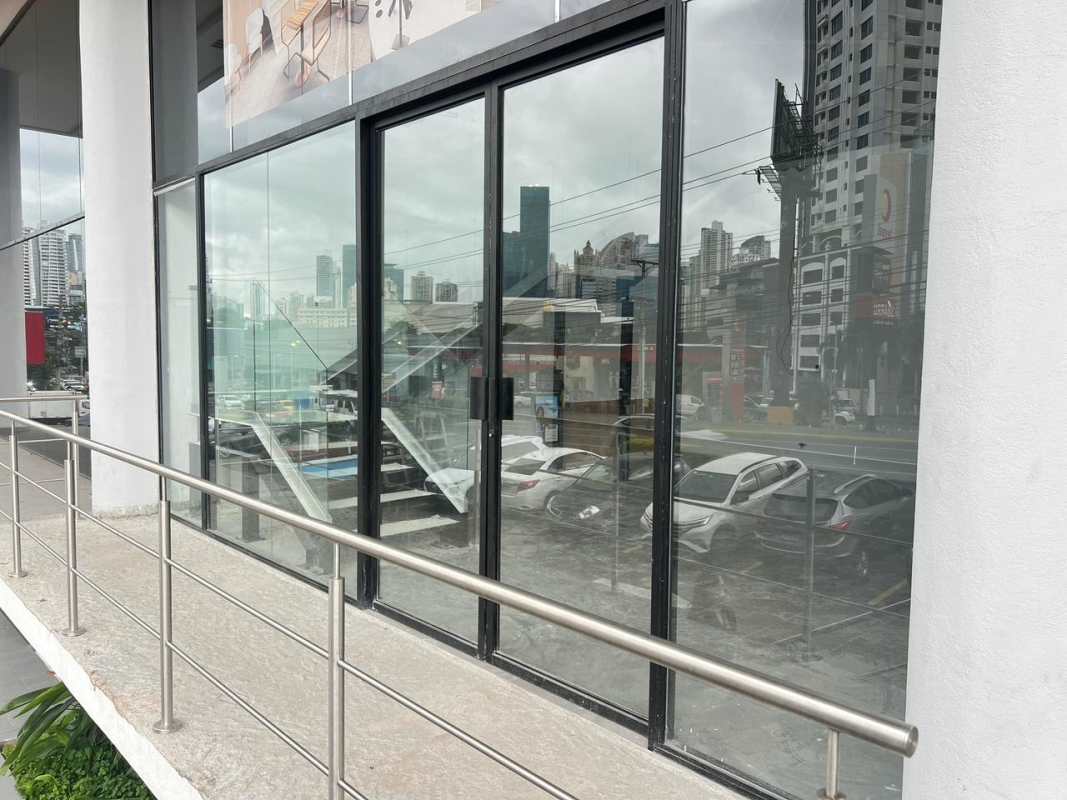 Modern commercial building with large glass windows and ramp access Calle 50 Obarrio Panama