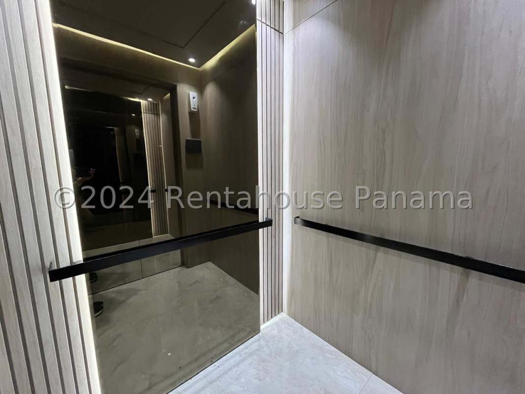 Modern empty living room with city view windows tiled floor PH Premium Tower Panama City