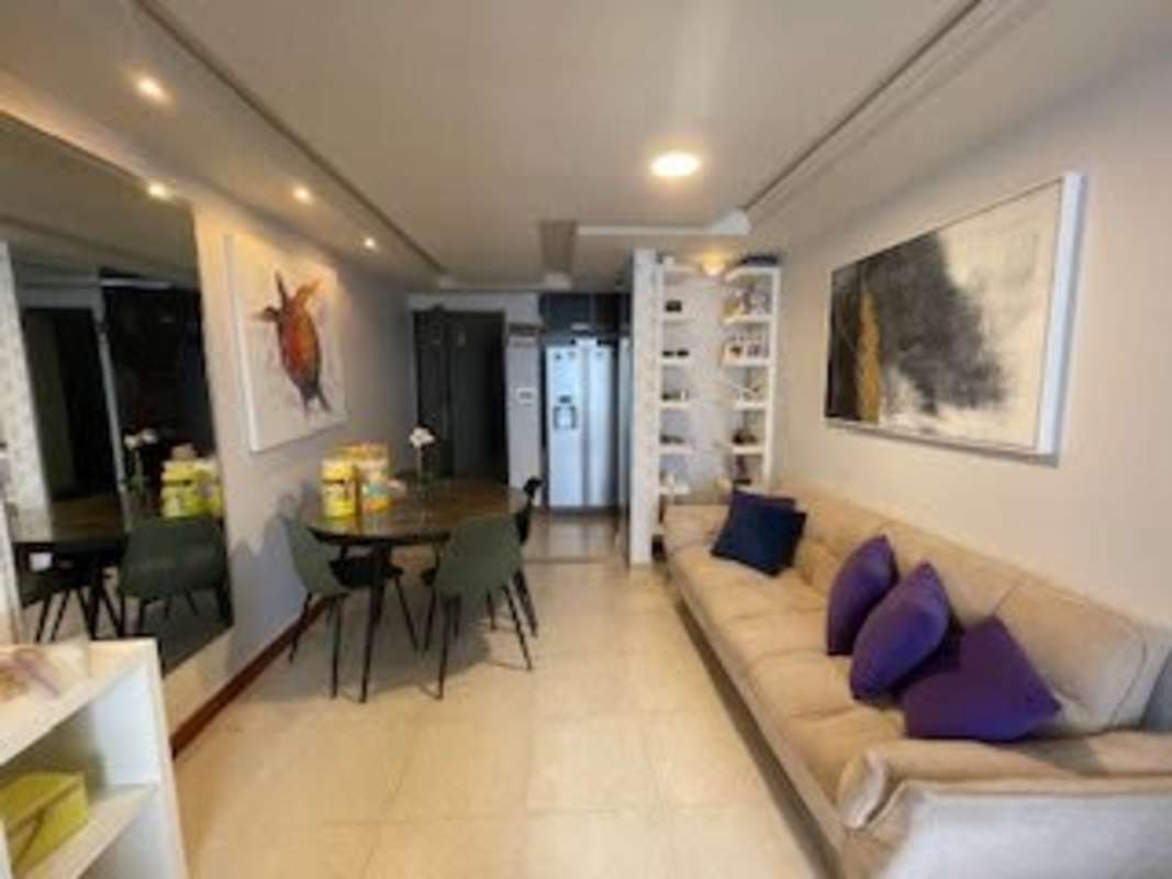 Modern bathroom with glass-enclosed shower and vessel sink at PH Splendor by The Park Via España Panama City