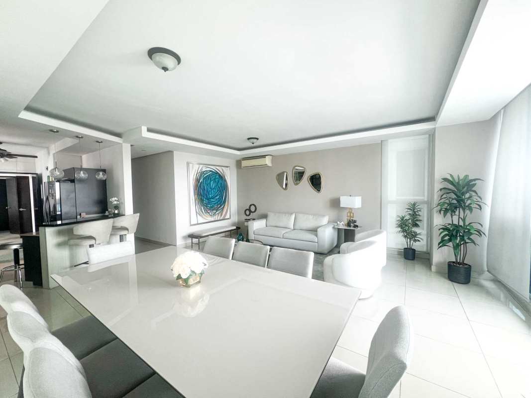 Modern kitchen with stone accent wall, cabinetry and appliances in PH The View San Francisco Panama