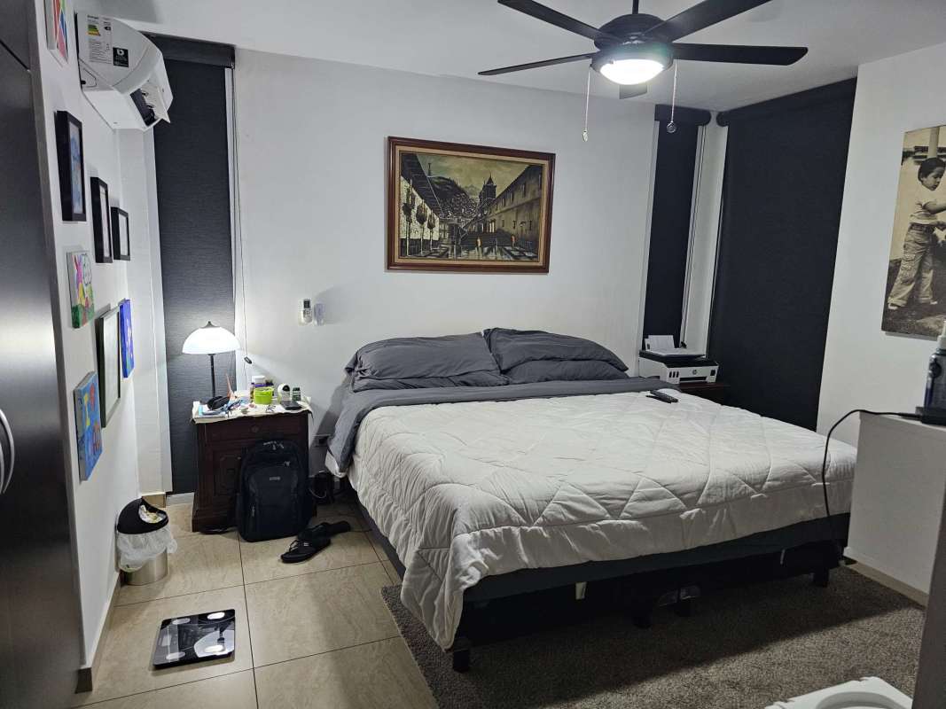 Kitchen with granite countertop, stainless appliances, dark cabinetry, PH Vista Park Carrasquilla Panama