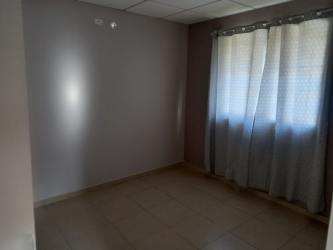 Spacious living area with tile floors and window in Corotú Vacamonte Panama