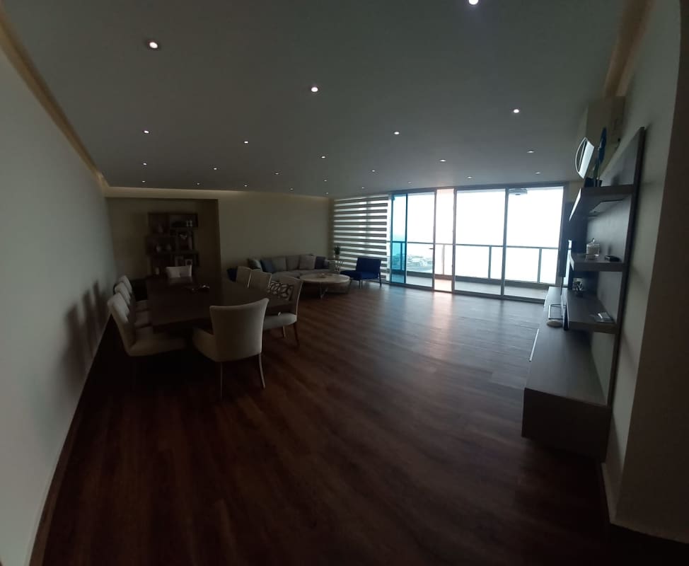 Spacious master bedroom with large windows and ocean views in Q Tower Punta Pacifica Panama City