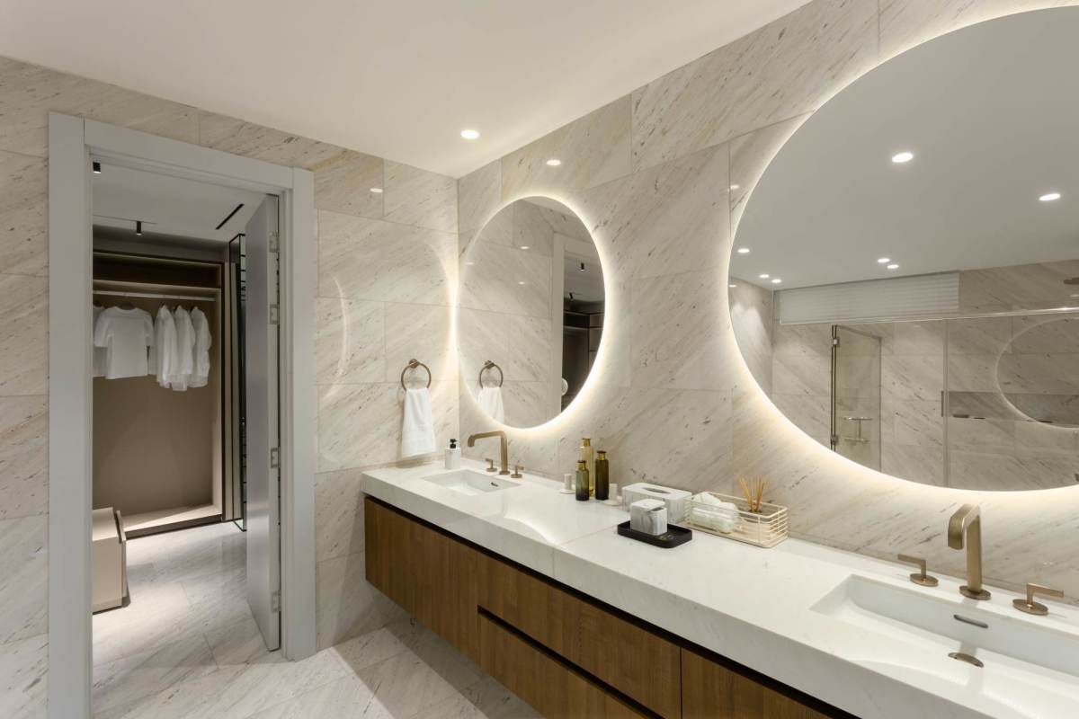 Modern living room with TV, floating desk, accent wall PH Pacific Point Panama