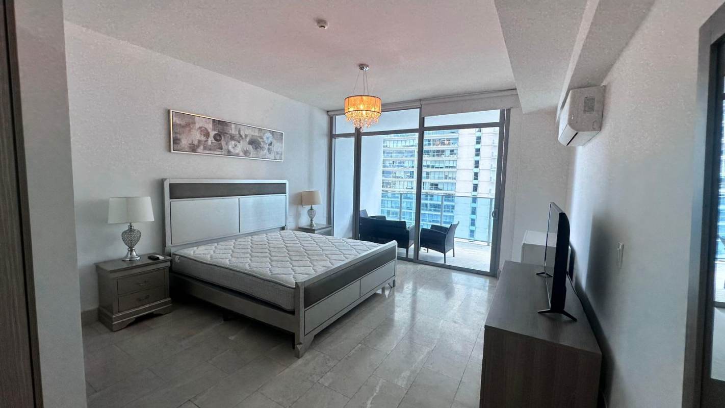 Master bedroom with floor-to-ceiling ocean views PH Ocean Club luxury condo Panama