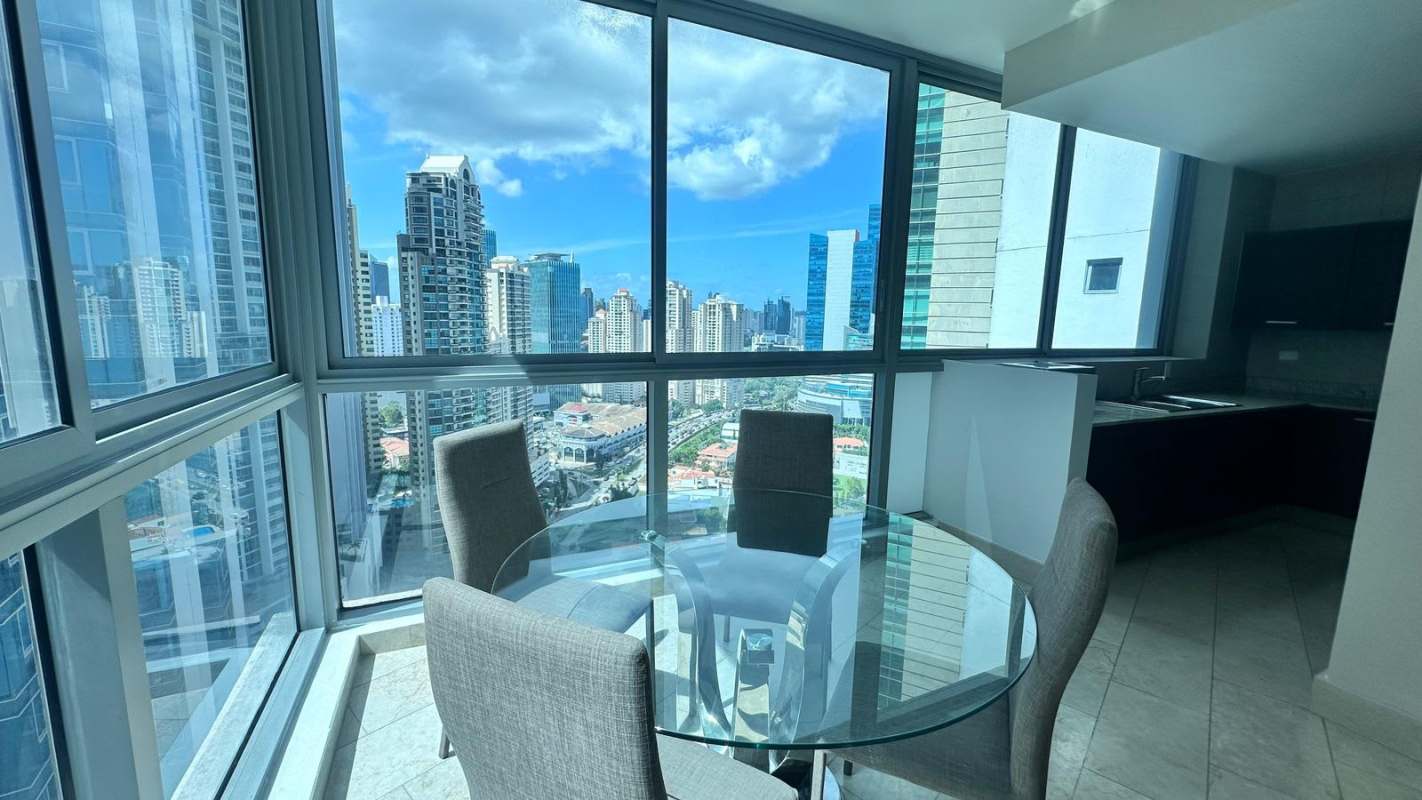 Dining area with panoramic city skyline in PH Ocean Club Punta Pacifica Panama