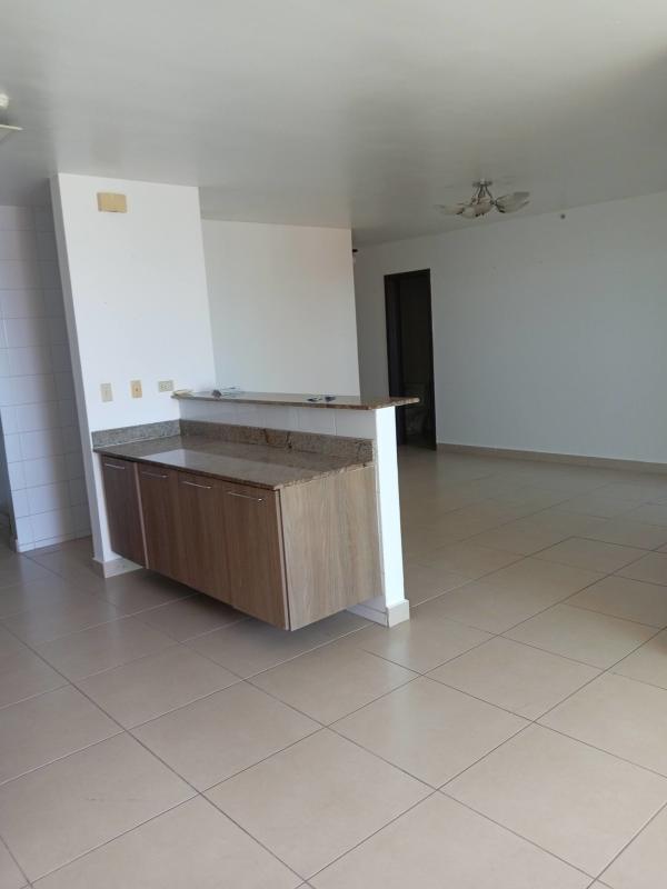 Open living room with sliding glass balcony doors PH Villa de las Fuentes Tower Panama City