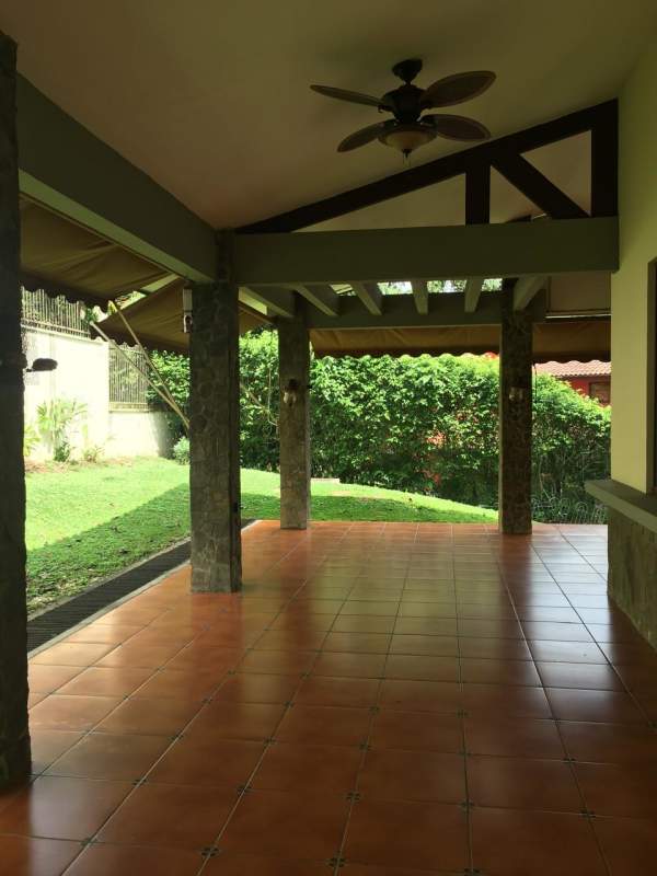 Private pool surrounded by lush garden view in PH Camino de Cruces Clayton Panama