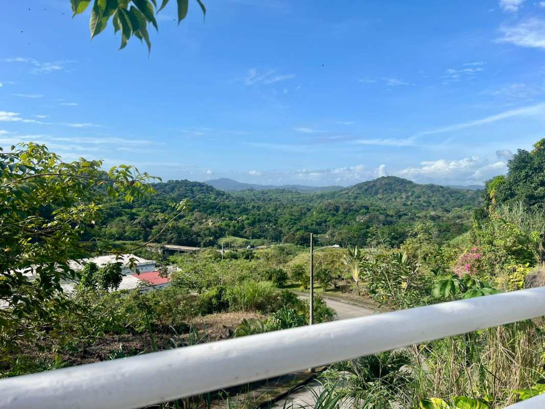 Master bedroom with tiled floors, ceiling fan, and private bathroom at PH Altamira Gardens Panama