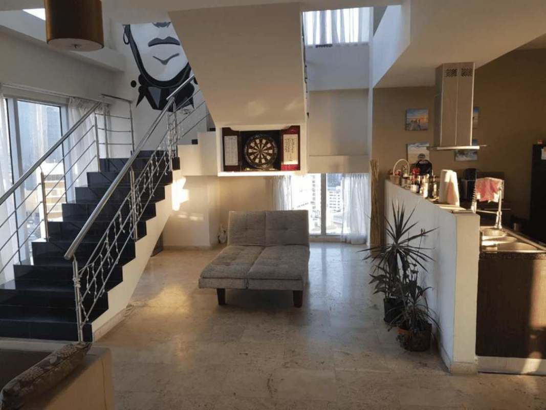 Stylish duplex living room kitchen staircase PH Marbella Tower Panama
