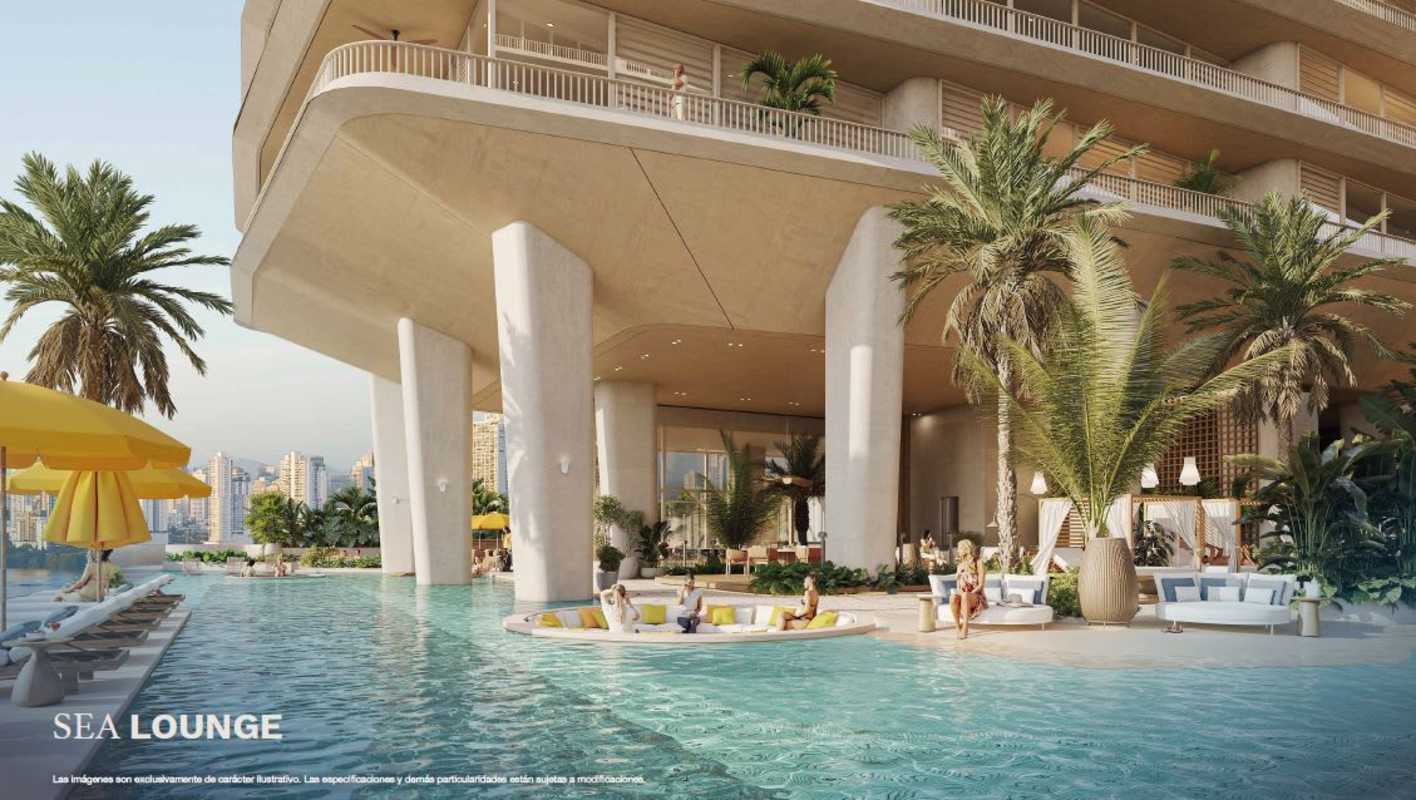 Expansive oceanfront swimming pools with lounge areas in PH Ipanema Costa del Este Panama City